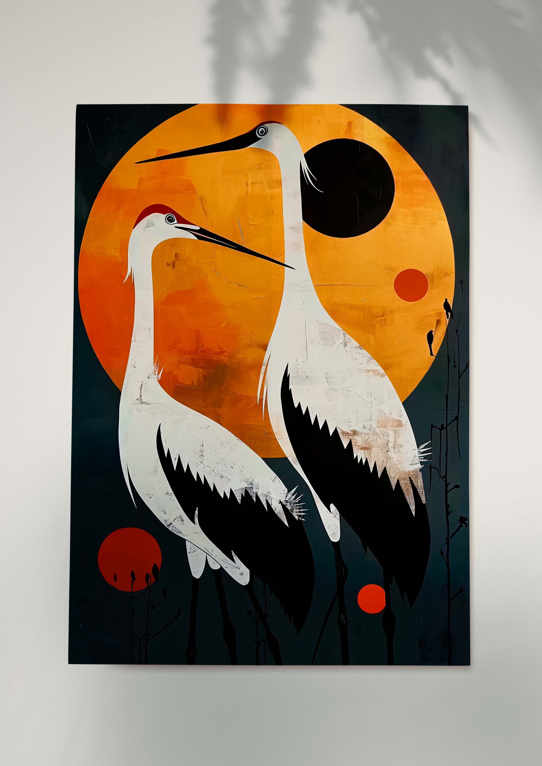 Minimalist illustration of two cranes in front of an orange sun.